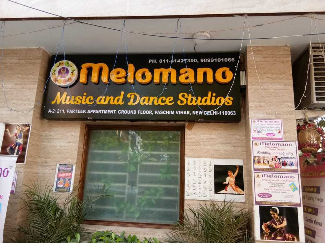 The Melomano Music and Dance Studios signboard and entrance at A-2/211, Paschim Vihar